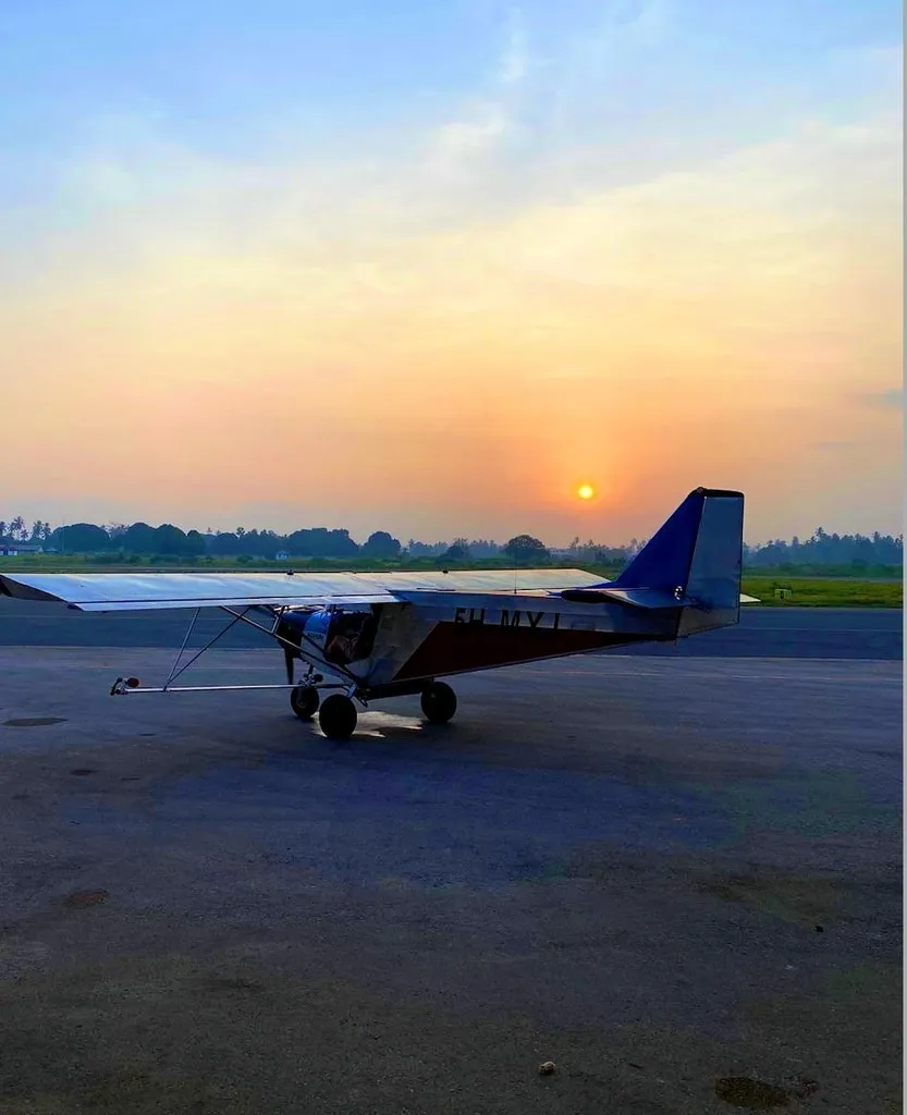 ZRP light sport aircraft on the tarmac at sunset, Zanzibar
